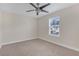 Spacious bedroom with neutral decor and window at 17841 Althea Blue Pl, Lutz, FL 33558