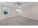 Bright bedroom with carpet and ceiling fan at 17841 Althea Blue Pl, Lutz, FL 33558