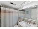 Updated bathroom with a new vanity and shower at 1868 Shore S Dr # 209, South Pasadena, FL 33707