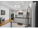 Modern kitchen with stainless steel appliances and granite countertops at 1868 Shore S Dr # 209, South Pasadena, FL 33707