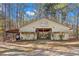 Large barn with covered parking area at 19256 Hidden Oaks Dr, Brooksville, FL 34604