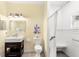 Updated bathroom with walk-in shower and modern vanity at 19256 Hidden Oaks Dr, Brooksville, FL 34604