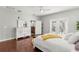 Main bedroom with hardwood floors and access to private deck at 19256 Hidden Oaks Dr, Brooksville, FL 34604