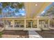 Charming house with a large front porch at 19256 Hidden Oaks Dr, Brooksville, FL 34604