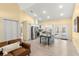 Open floor plan showing kitchen, dining, and living room at 19256 Hidden Oaks Dr, Brooksville, FL 34604