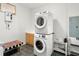Laundry room with washer, dryer, and additional storage at 19256 Hidden Oaks Dr, Brooksville, FL 34604