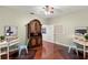 Home office with two desks, chairs, and built-in storage at 19256 Hidden Oaks Dr, Brooksville, FL 34604