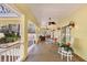 Relaxing porch with seating area and ceiling fan at 19256 Hidden Oaks Dr, Brooksville, FL 34604