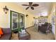 Spacious porch with wicker furniture and a view at 19256 Hidden Oaks Dr, Brooksville, FL 34604