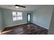 Living room with light walls and wood floors at 20 Cypress Dr, Palm Harbor, FL 34684