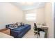 Small bedroom with daybed, desk and window at 211 Harmony Ln, Brandon, FL 33511