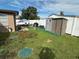 Large backyard with shed and green space at 2152 Arcadia Rd, Holiday, FL 34690
