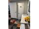 Bathroom with double vanity and geometric rug at 2152 Arcadia Rd, Holiday, FL 34690