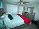 Spacious main bedroom with king-size bed and walk-in closet at 2152 Arcadia Rd, Holiday, FL 34690