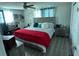 Large main bedroom with king-size bed and ceiling fan at 2152 Arcadia Rd, Holiday, FL 34690