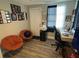 Home office with two comfy chairs and a work desk at 2152 Arcadia Rd, Holiday, FL 34690