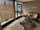 Relaxing screened porch with wicker furniture and plants at 2152 Arcadia Rd, Holiday, FL 34690