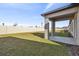 Spacious backyard with grassy lawn and privacy fence at 22103 Blazing Star Run, Land O Lakes, FL 34637