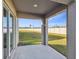 Covered patio overlooking a fenced backyard at 22103 Blazing Star Run, Land O Lakes, FL 34637