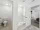 Bathroom with walk-in shower and toilet at 22103 Blazing Star Run, Land O Lakes, FL 34637