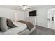Comfortable bedroom with dresser and ceiling fan at 22103 Blazing Star Run, Land O Lakes, FL 34637