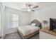 Cozy bedroom with window blinds and ceiling fan at 22103 Blazing Star Run, Land O Lakes, FL 34637