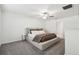 Spacious bedroom with carpeted floor and ceiling fan at 22103 Blazing Star Run, Land O Lakes, FL 34637