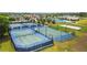 Tennis and basketball courts in a community setting at 22103 Blazing Star Run, Land O Lakes, FL 34637