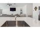 Modern kitchen with stainless steel appliances and white cabinetry at 22103 Blazing Star Run, Land O Lakes, FL 34637