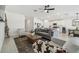 Open living room, modern furniture and large windows at 22103 Blazing Star Run, Land O Lakes, FL 34637