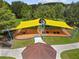 Community playground with shaded play areas at 22103 Blazing Star Run, Land O Lakes, FL 34637
