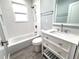 Updated bathroom, featuring a white vanity and subway tile at 2720 9Th N Ave, St Petersburg, FL 33713