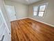 Spacious bedroom with hardwood floors and large windows at 2720 9Th N Ave, St Petersburg, FL 33713