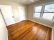 Spacious bedroom with hardwood floors and large windows at 2720 9Th N Ave, St Petersburg, FL 33713