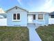 Charming light blue house with white trim, steps, and walkway at 2720 9Th N Ave, St Petersburg, FL 33713