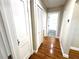 Clean hallway with hardwood floors and white doors at 2720 9Th N Ave, St Petersburg, FL 33713