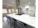 Open concept kitchen with breakfast bar and stainless steel appliances at 2720 9Th N Ave, St Petersburg, FL 33713