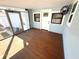 Screened porch with wood flooring and access to backyard at 2720 9Th N Ave, St Petersburg, FL 33713