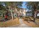 Backyard with storage shed and walkway at 305 E Hanlon St, Tampa, FL 33604