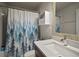 Bathroom with a shower/tub combo and vanity at 305 E Hanlon St, Tampa, FL 33604
