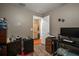 Bedroom with mini-fridge and workspace at 305 E Hanlon St, Tampa, FL 33604