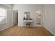 Bright bedroom with hardwood floors and access to bathroom and closet at 305 E Hanlon St, Tampa, FL 33604