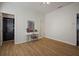 Bedroom with hardwood floors, walk-in closet, and dressing vanity at 305 E Hanlon St, Tampa, FL 33604