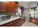 Modern kitchen with stainless steel appliances and quartz countertops at 305 E Hanlon St, Tampa, FL 33604