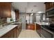 Modern kitchen with stainless steel appliances and an island at 305 E Hanlon St, Tampa, FL 33604