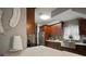 Modern kitchen with stainless steel sink and dark wood cabinets at 305 E Hanlon St, Tampa, FL 33604