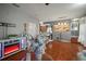 Open concept living area with hardwood floors and kitchen views at 305 E Hanlon St, Tampa, FL 33604