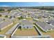 Aerial view of house and neighborhood at 3059 Nubbin Ridge Ln, Zephyrhills, FL 33540