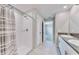 Modern bathroom with shower and double vanity at 3059 Nubbin Ridge Ln, Zephyrhills, FL 33540