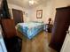 Bedroom with a double bed and a dark wood dresser at 34071 Avocado N Dr, Pinellas Park, FL 33781